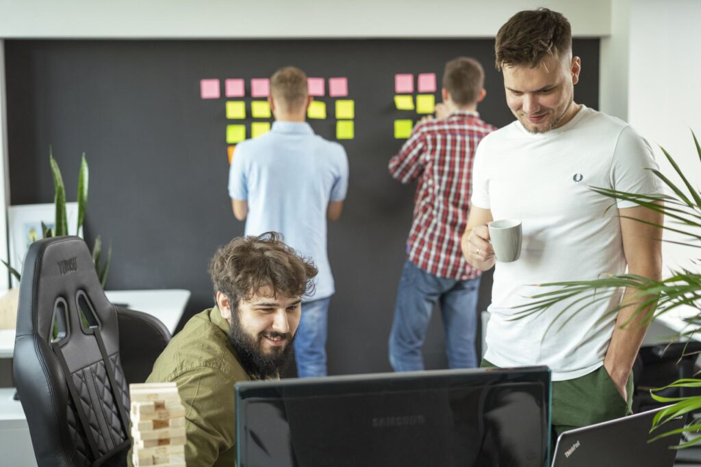 multishoring developers in the office working on iot installation services & software