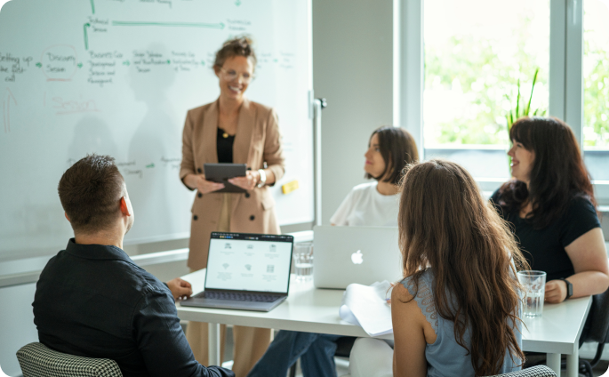 Multishoring team discussing Expert IT Integration Services and Consulting