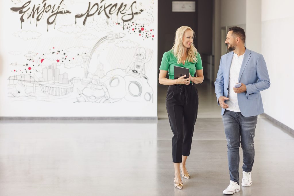 two data governance consultants in a hall