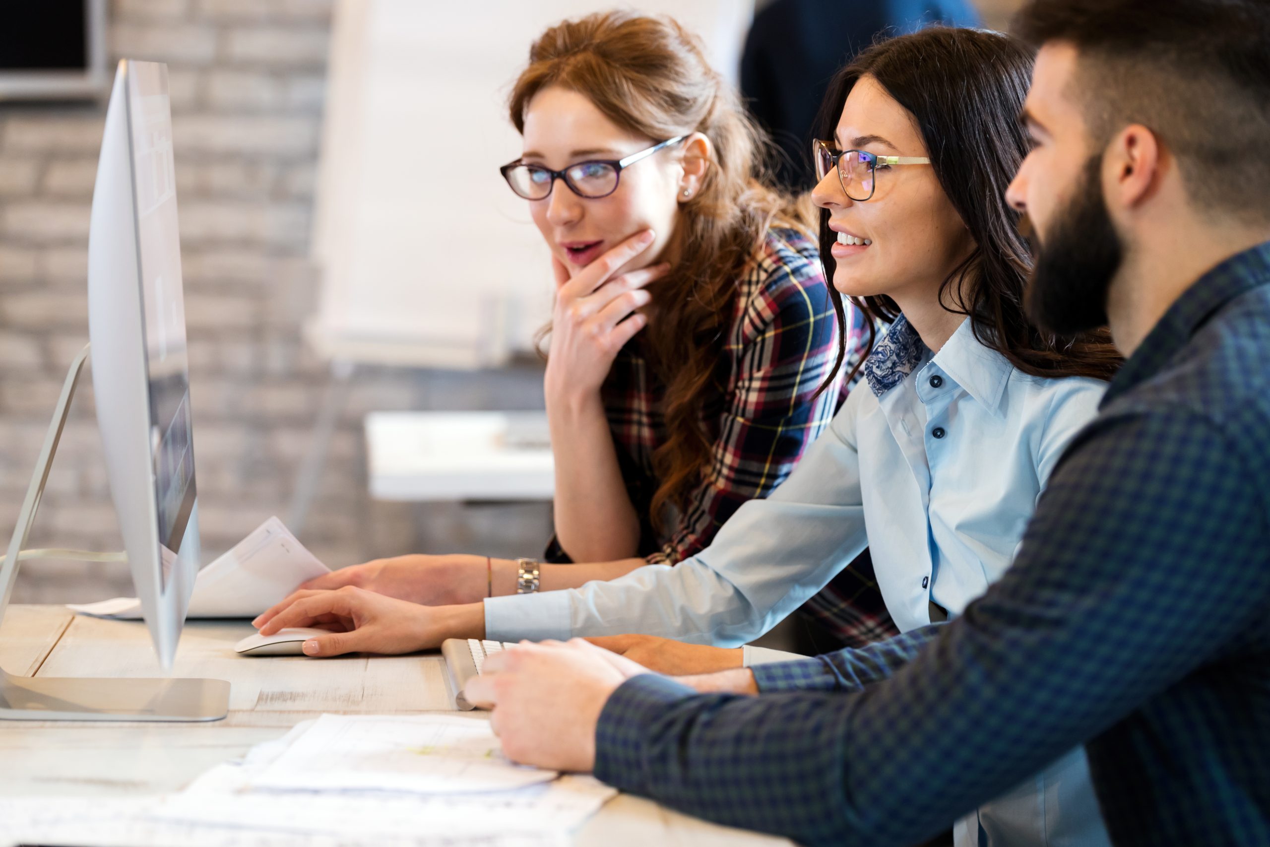 young people working on a data governance consulting project