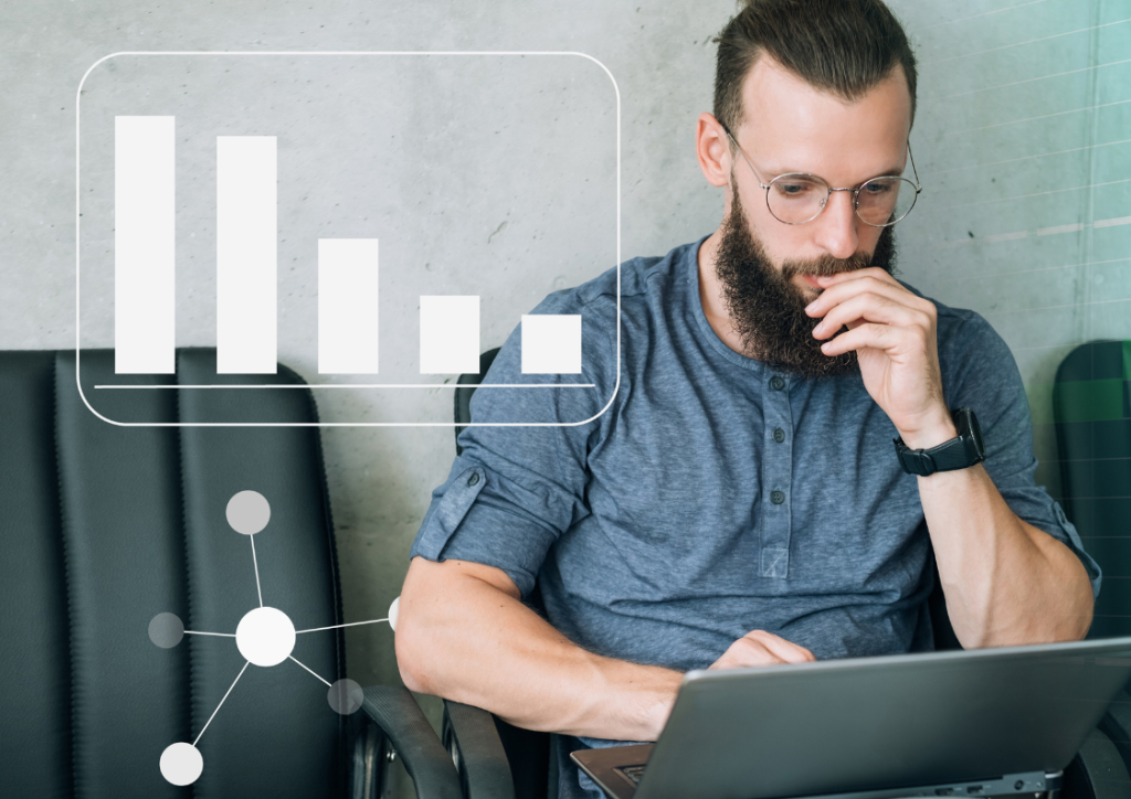 man with a laptop choosing between power bi vs excel
